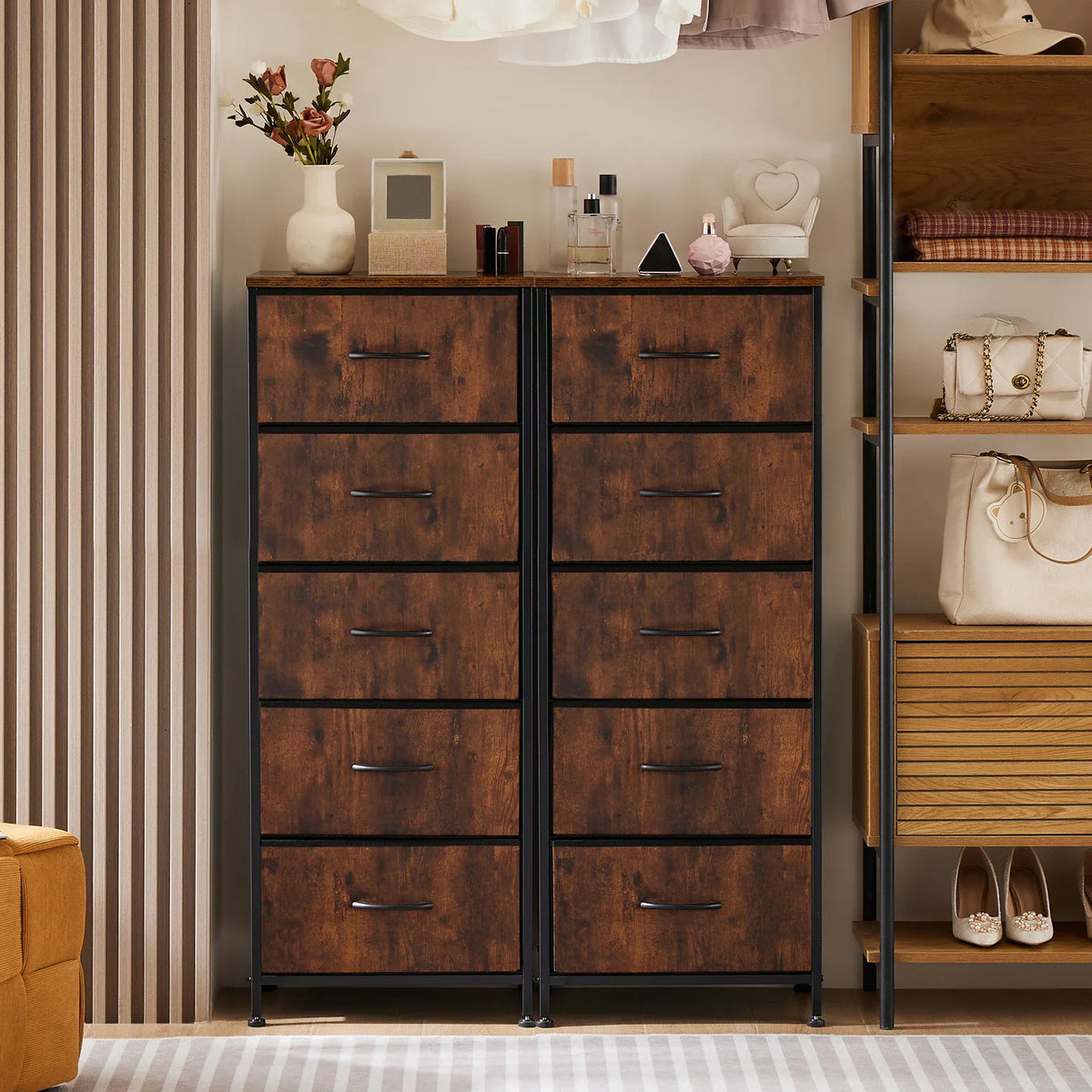 Two tall 5-drawer storage units placed side-by-side in a bedroom closet area.