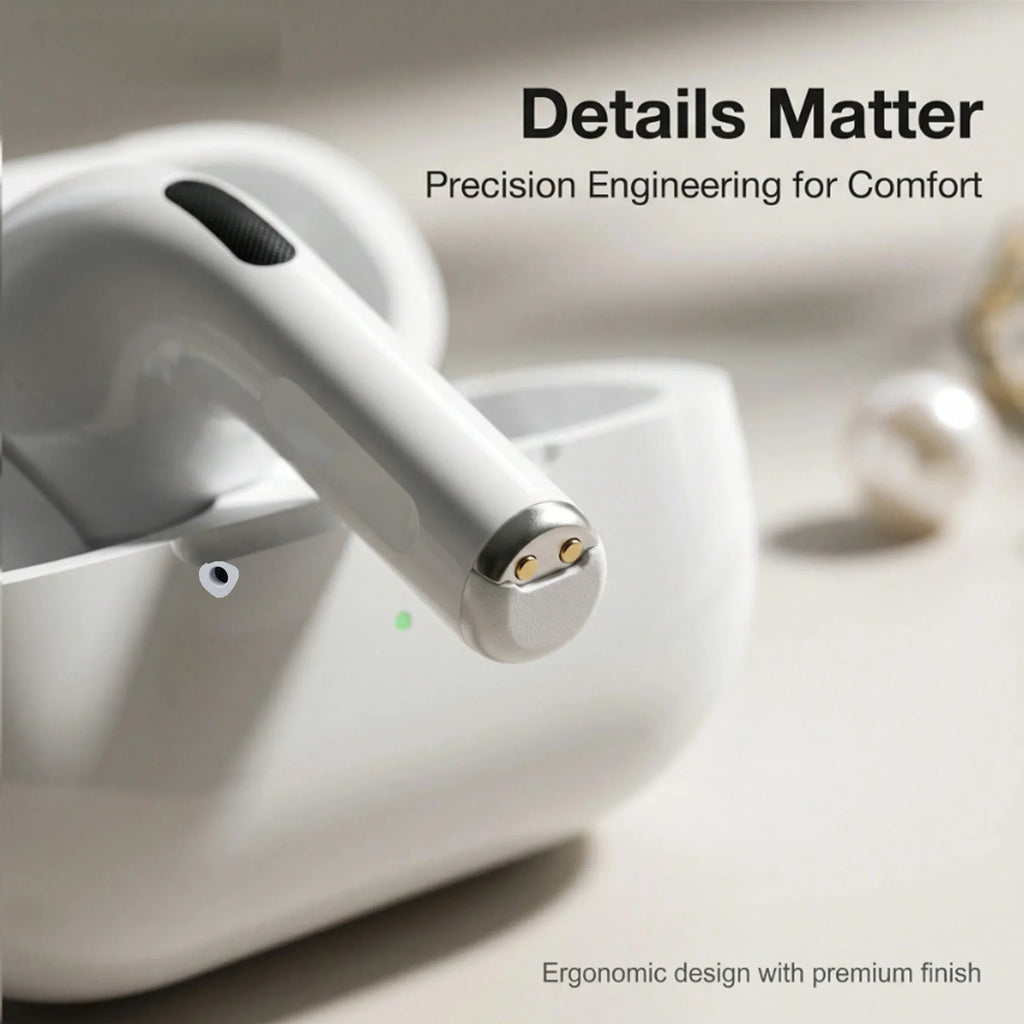 Close-up of white wireless earbud with gold charging contacts