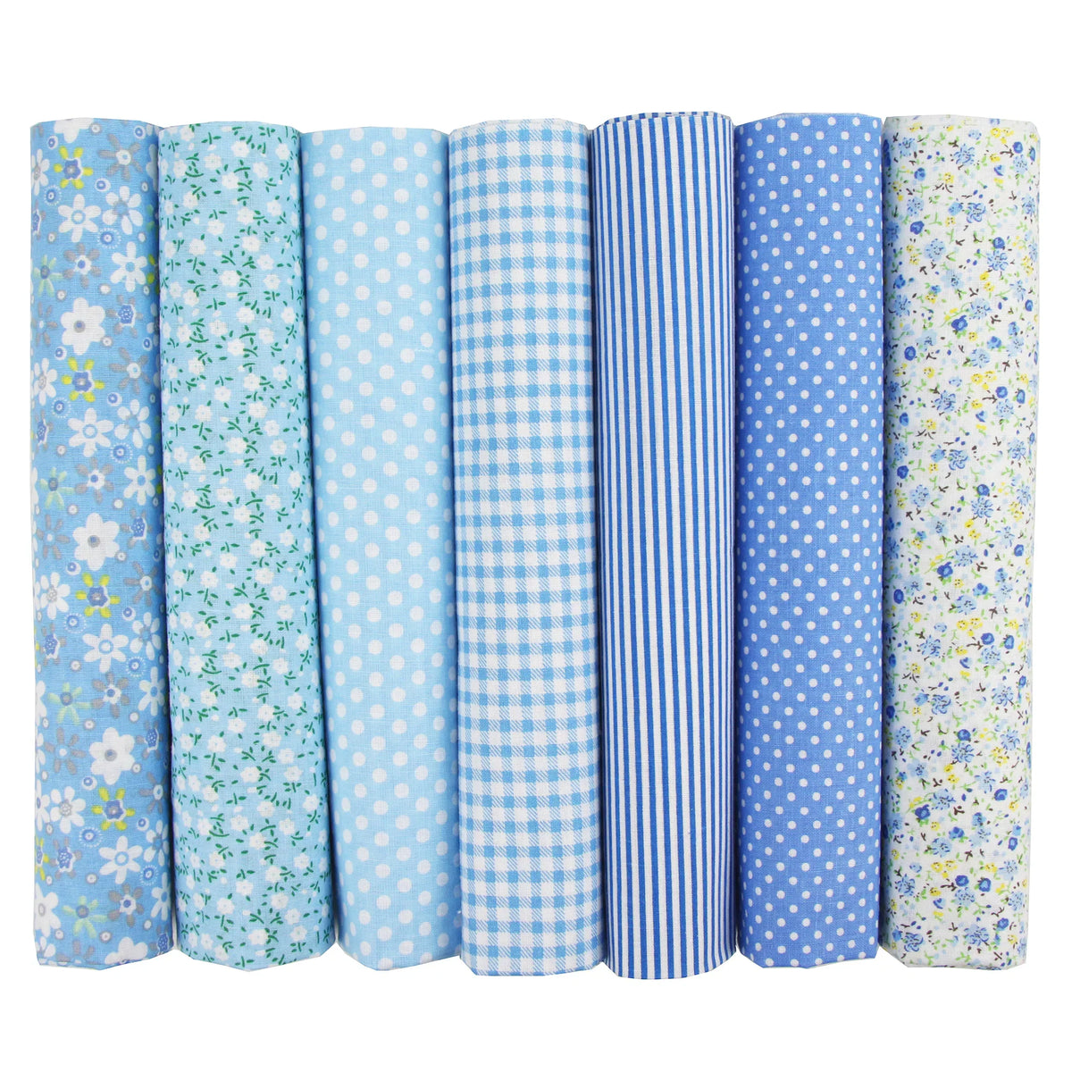Seven rolls of blue fabric with various patterns including flowers, dots, gingham, and stripes.