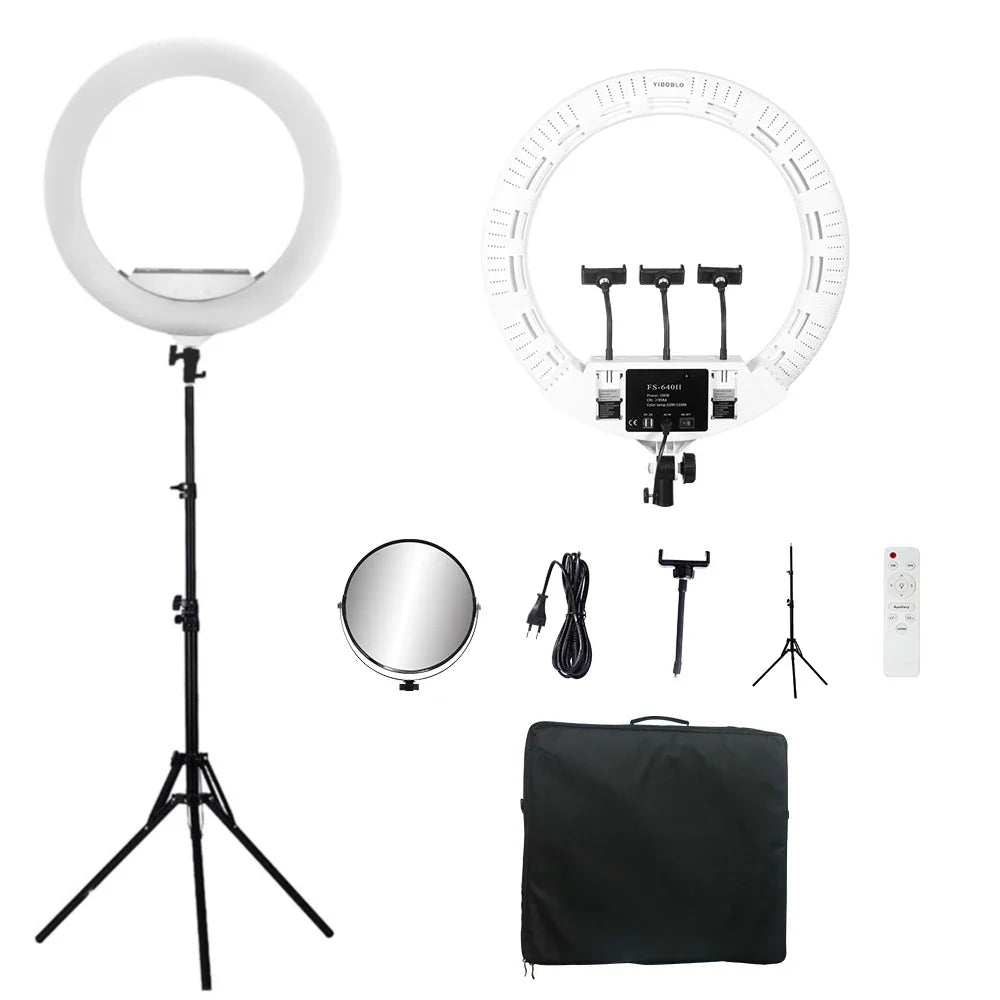 A large LED ring light set with tripod stand, mirror, phone mounts, remote control, and carrying bag