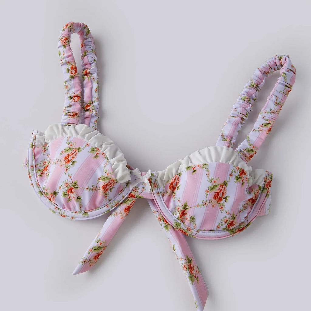 Underwire bikini top with ruffled trim and pink floral striped pattern