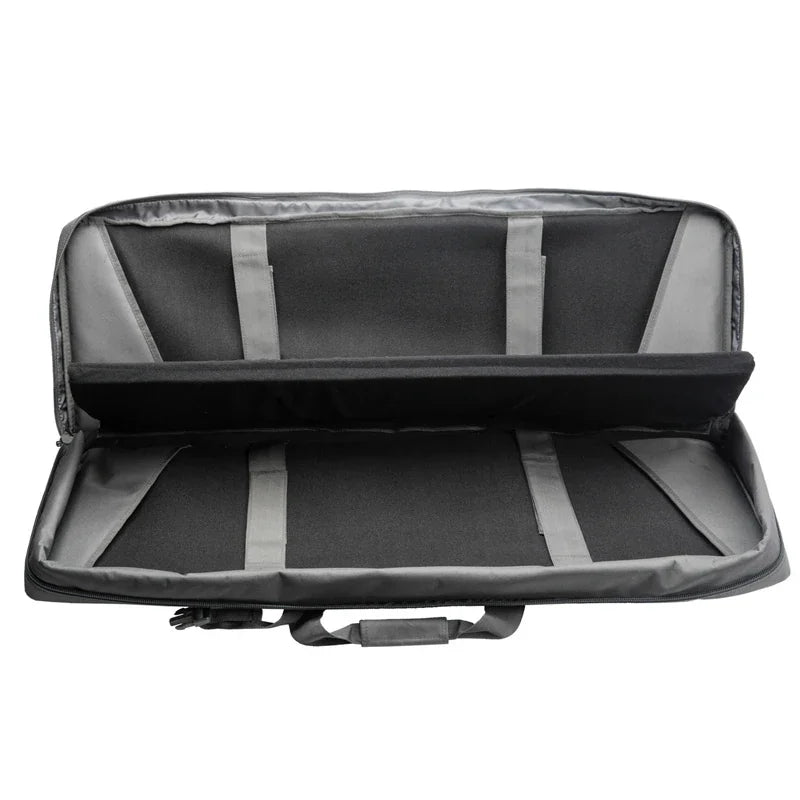 Open interior of a grey tactical rifle bag with padded dividers and velcro securing straps