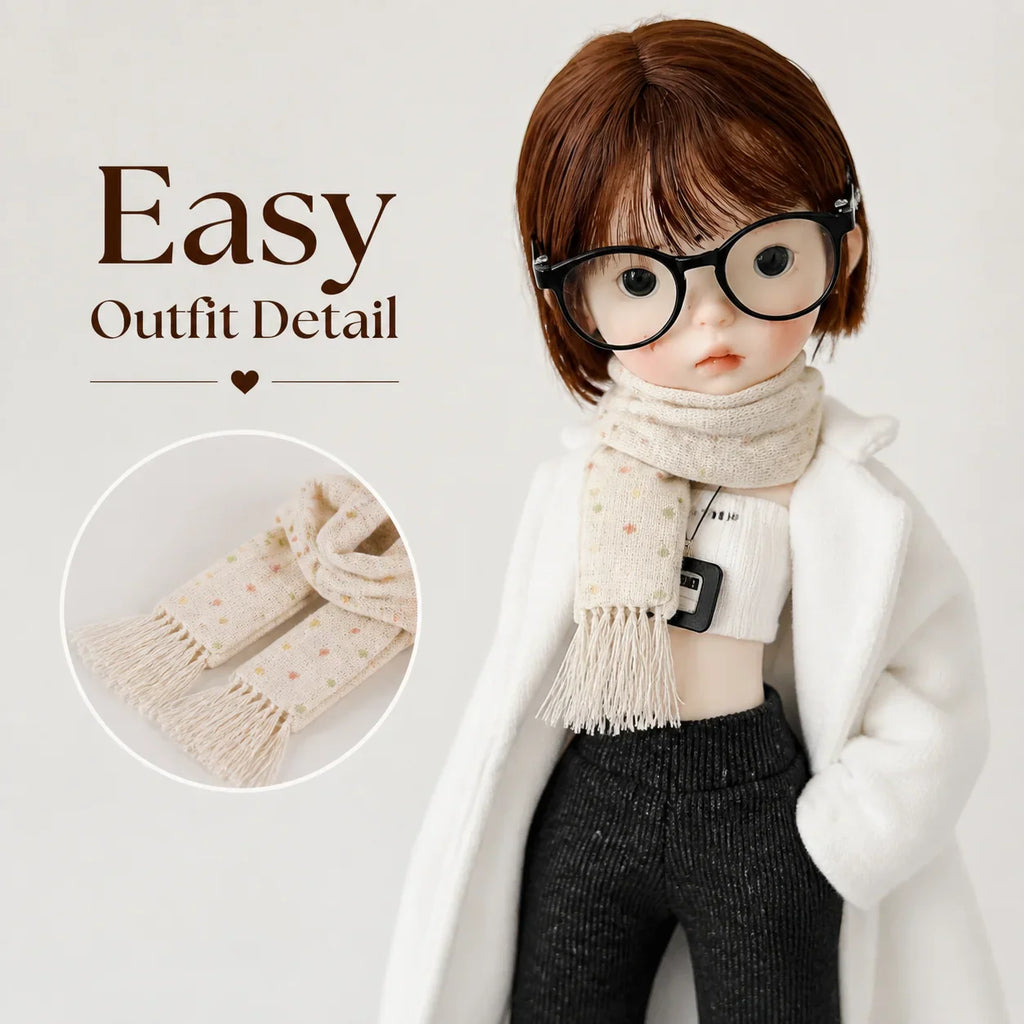 A doll wearing a plaid scarf with a zoomed-in detail of the fabric texture in a circle
