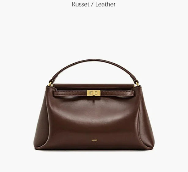 Russet brown leather mini top handle handbag