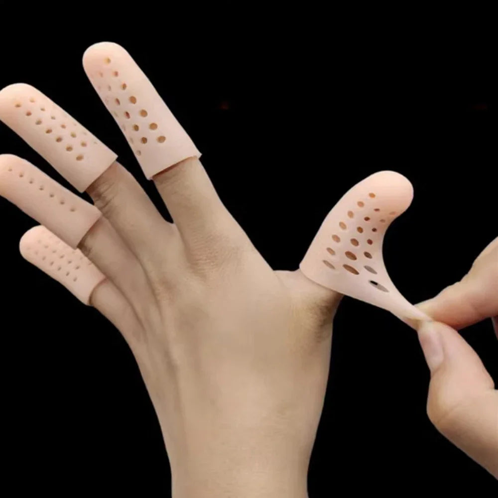 Hand wearing flexible silicone finger protectors with ventilation holes