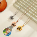 Set of three stainless steel paw-shaped projection necklaces in silver, rose gold, and gold.