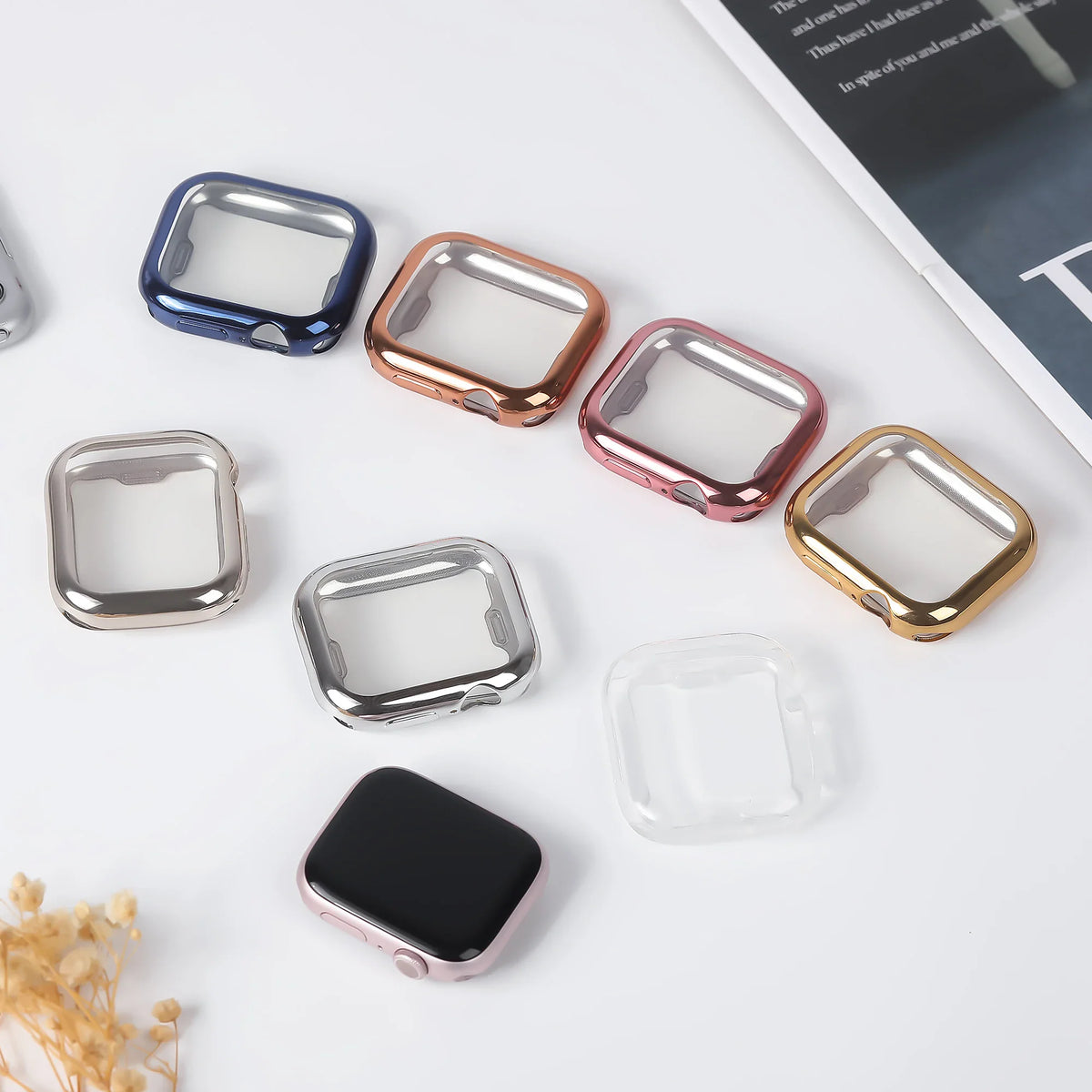 Assorted colors of shiny protective bumper cases for smartwatches.