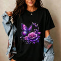 Woman wearing a black short-sleeve t-shirt with a purple butterfly and rose floral print
