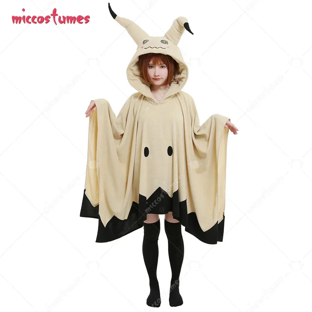 A beige hooded cosplay poncho with black details worn by a person.