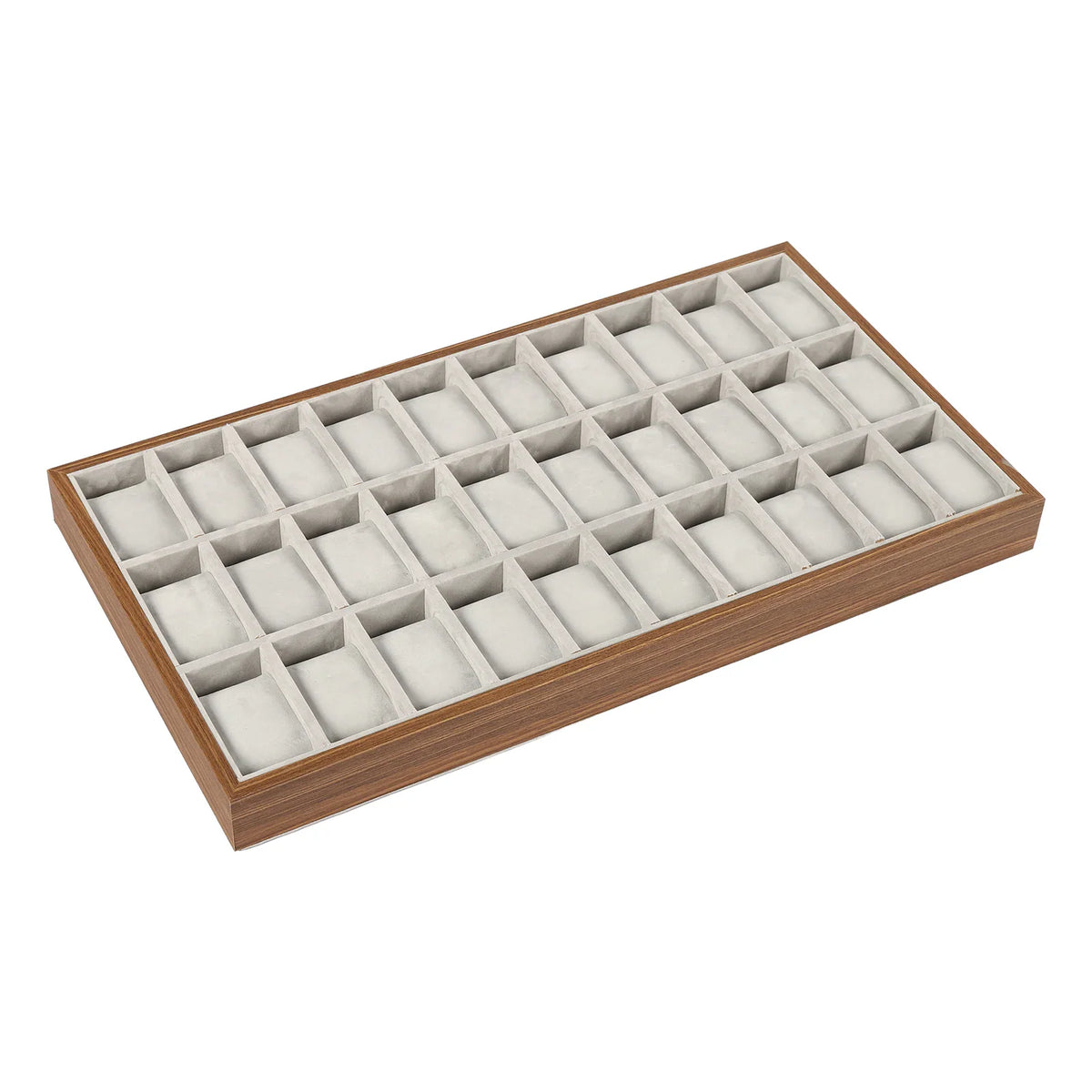 Empty 30-slot wooden watch display tray at an angle
