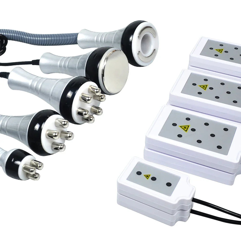 A collection of various treatment wands and applicator heads for a body contouring device.