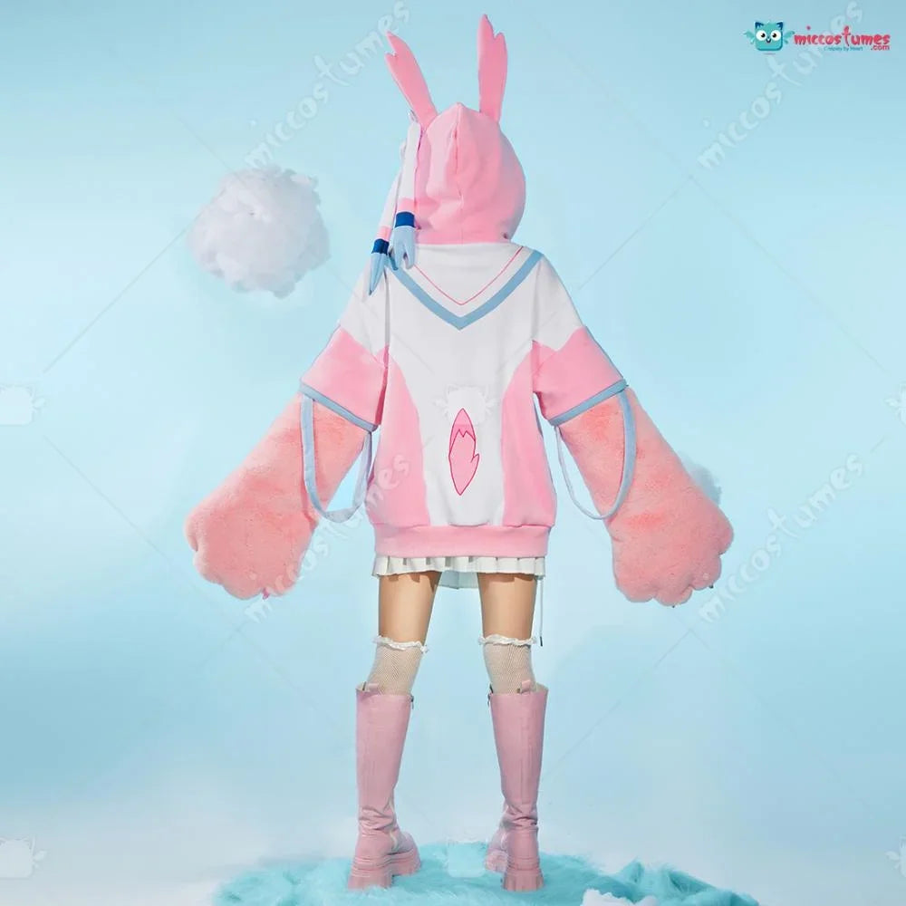 Rear view of a person in a pink and white cosplay hoodie with a tail and fur sleeves