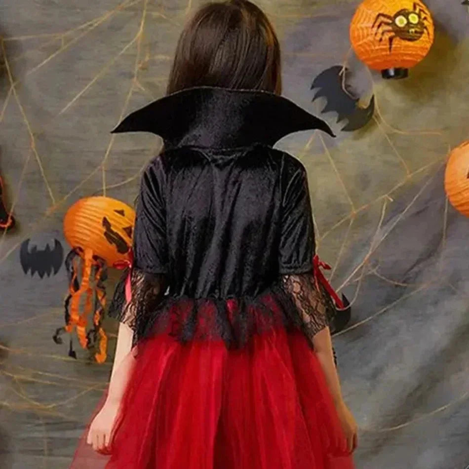 Back view of a girl wearing a black and red vampire dress with a high collar