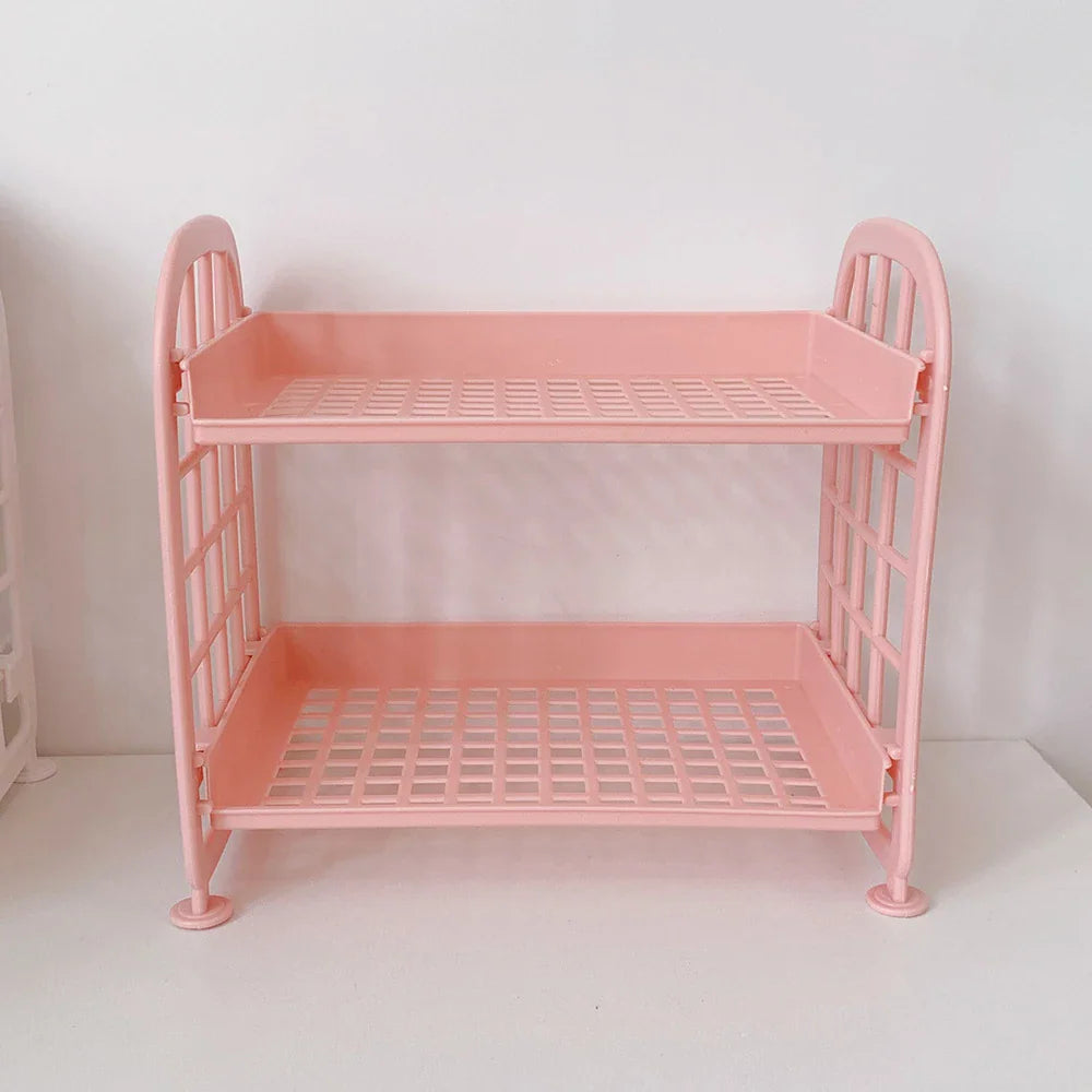 Pink two-tier plastic desk storage shelf