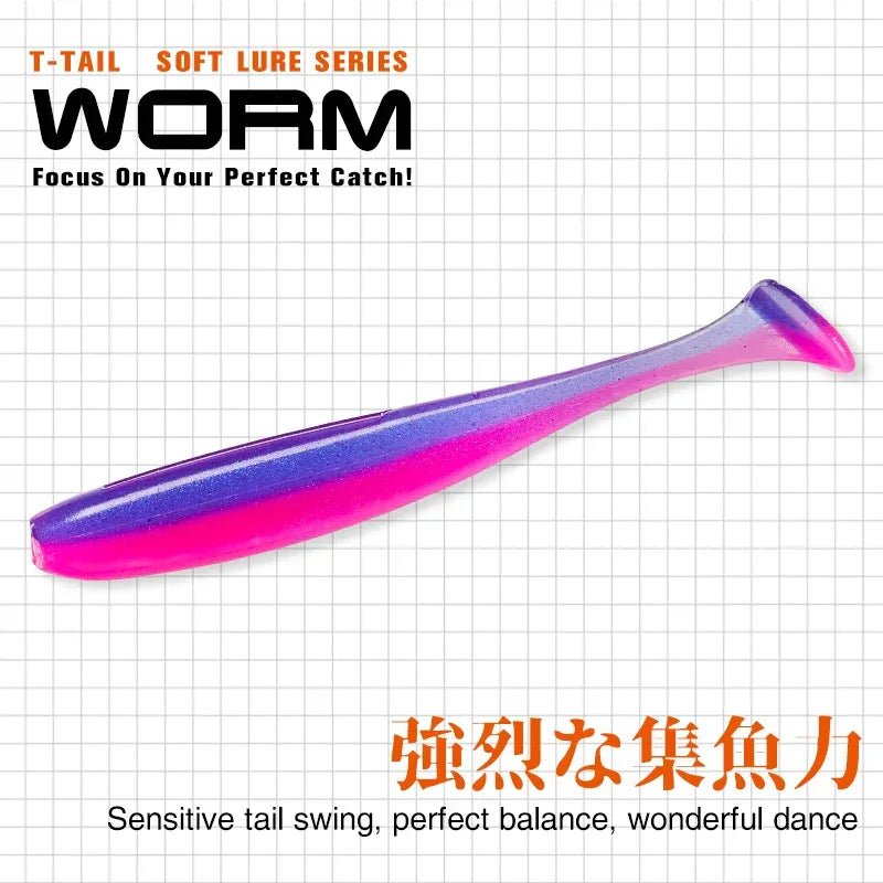 A single purple and pink T-tail soft plastic fishing lure