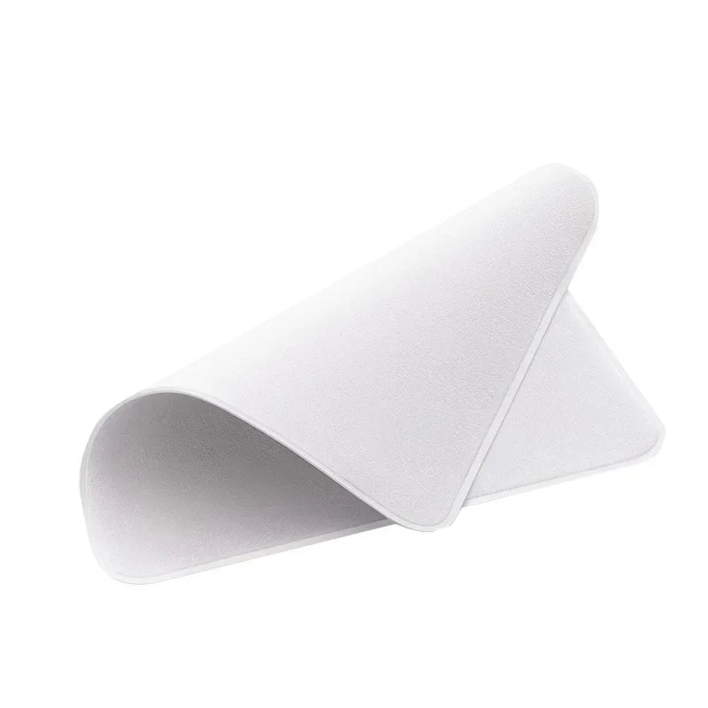 Grey microfiber cleaning cloth folded in a corner