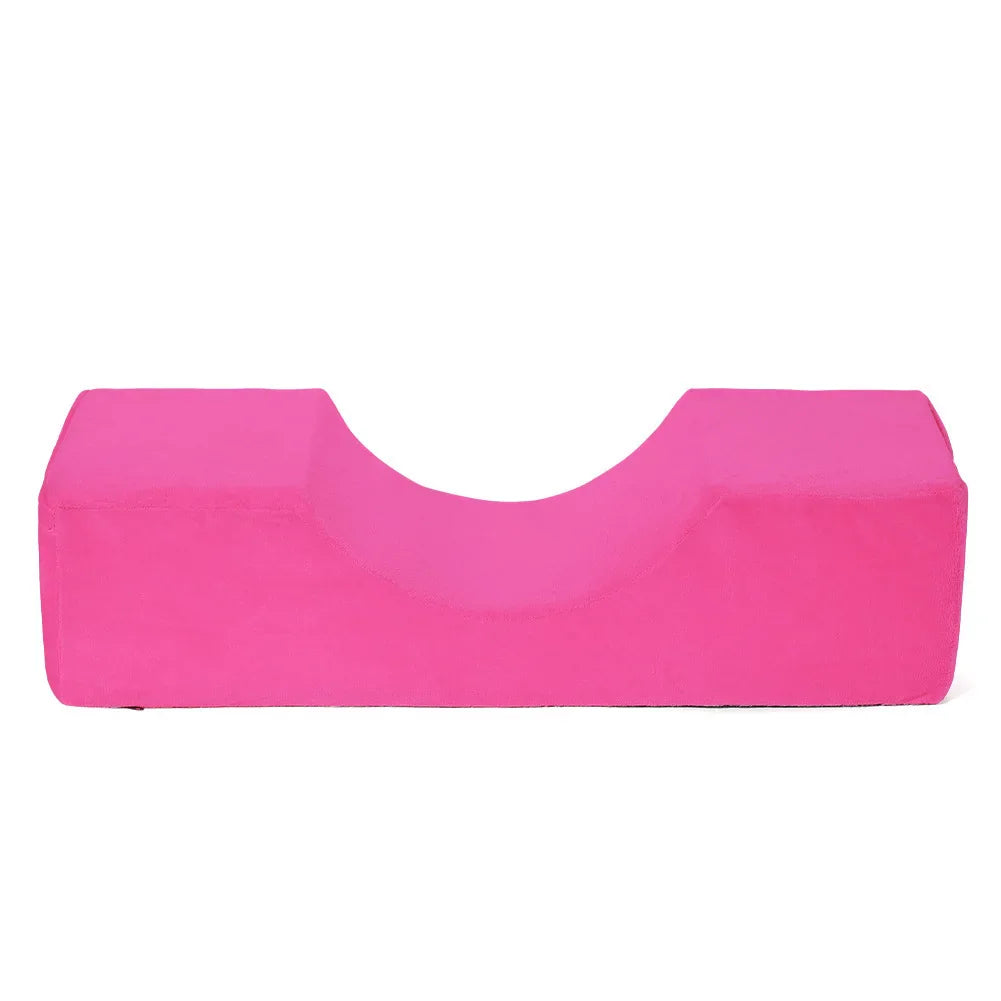 Fuchsia U-shaped memory foam ergonomic neck pillow for professional eyelash extension services