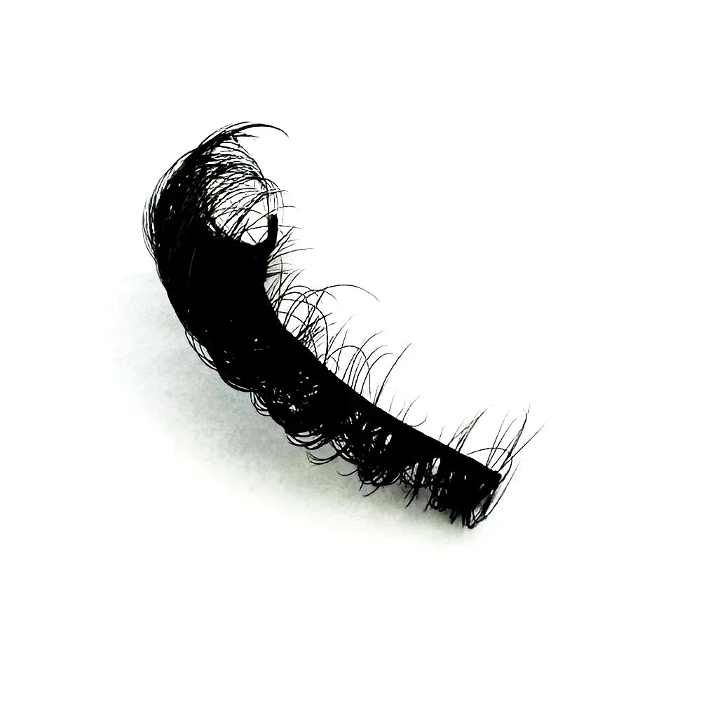 A single strip of black wispy false eyelashes