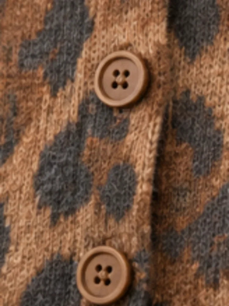 Close up of brown buttons on a textured leopard print knit cardigan