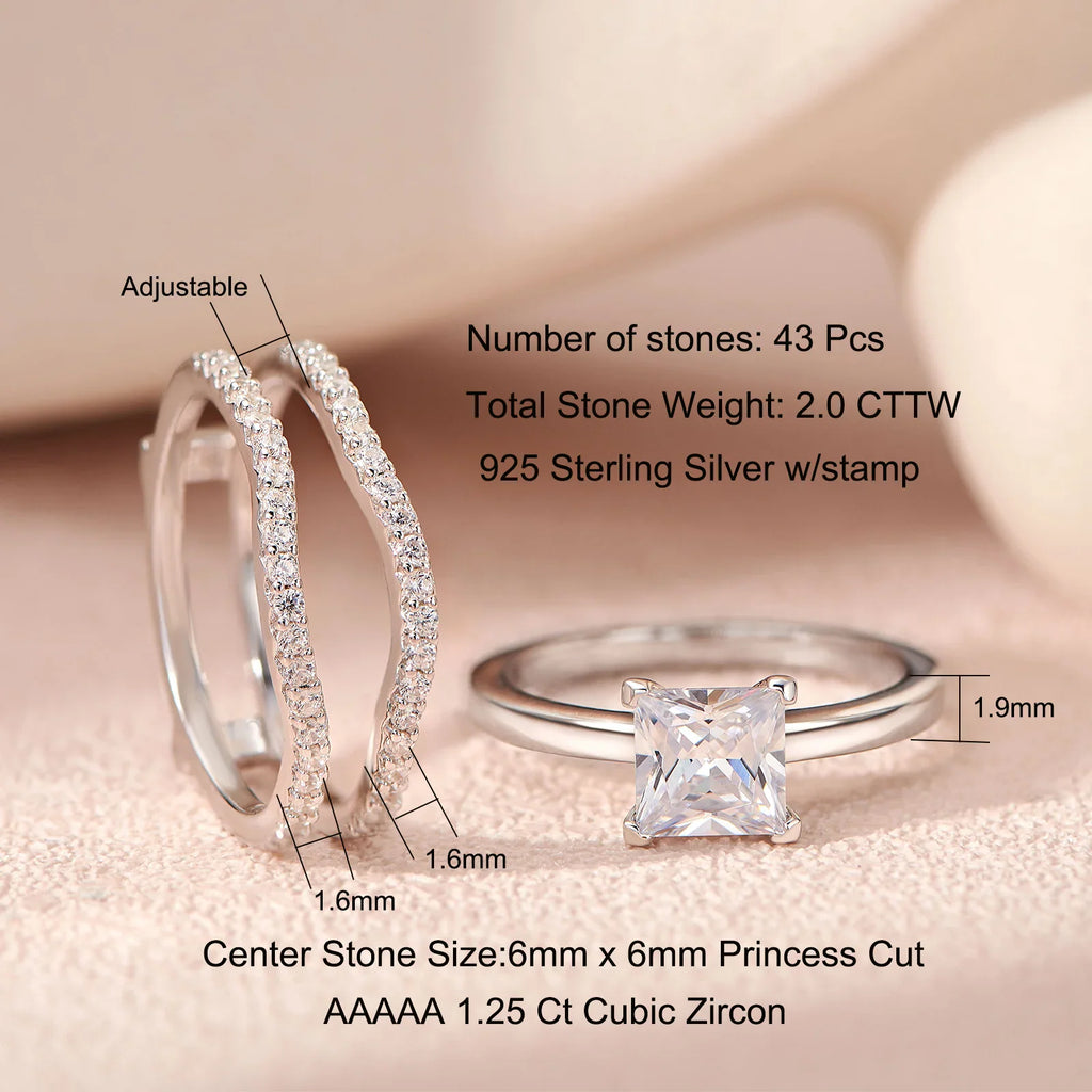 Detailed view of sterling silver rings with princess cut cubic zirconia stones and size dimensions.