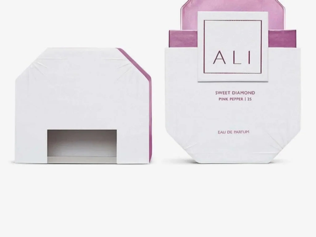 Two pieces of white and pink octagonal perfume packaging boxes