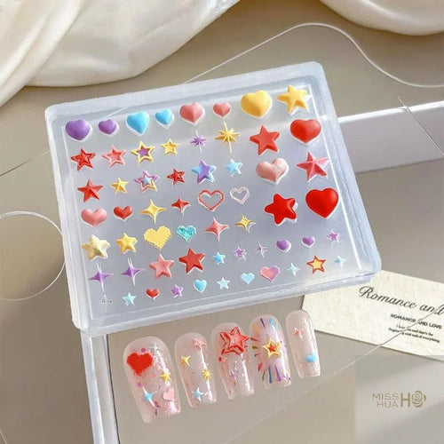 Transparent silicone mold for 3D heart and star nail art decorations with finished sample nails
