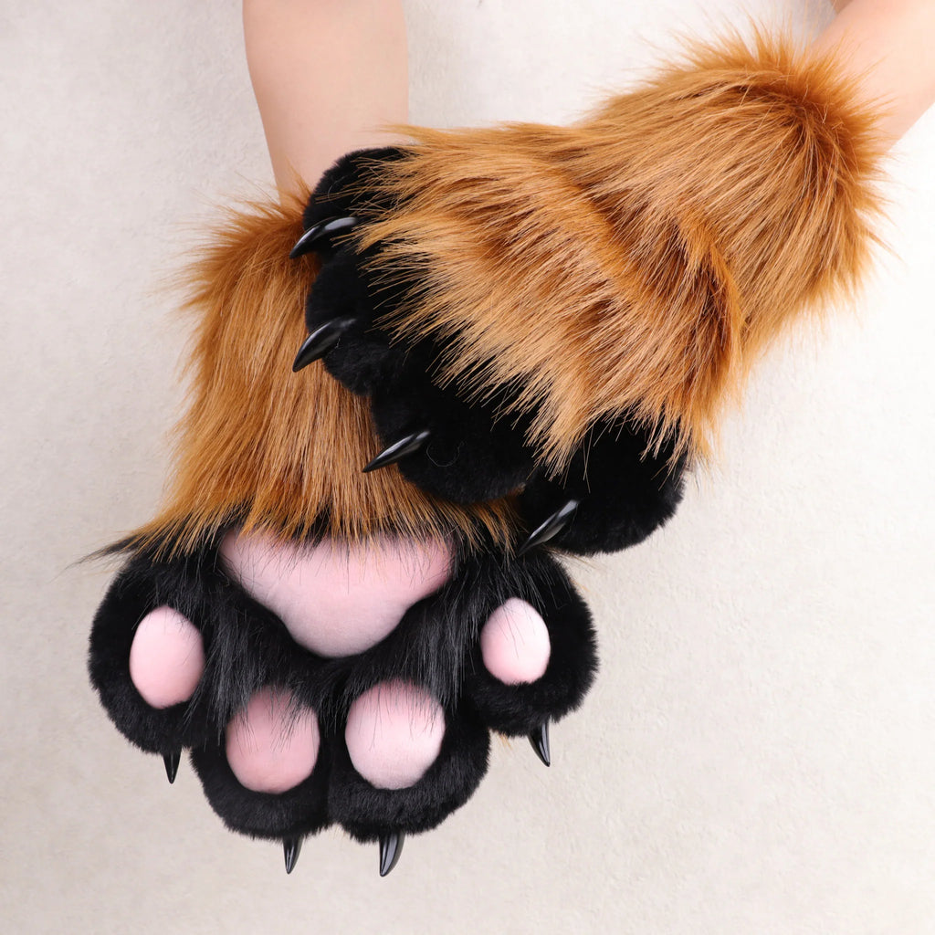 Brown and black faux fur animal paw gloves with pink paw pads and black claws.