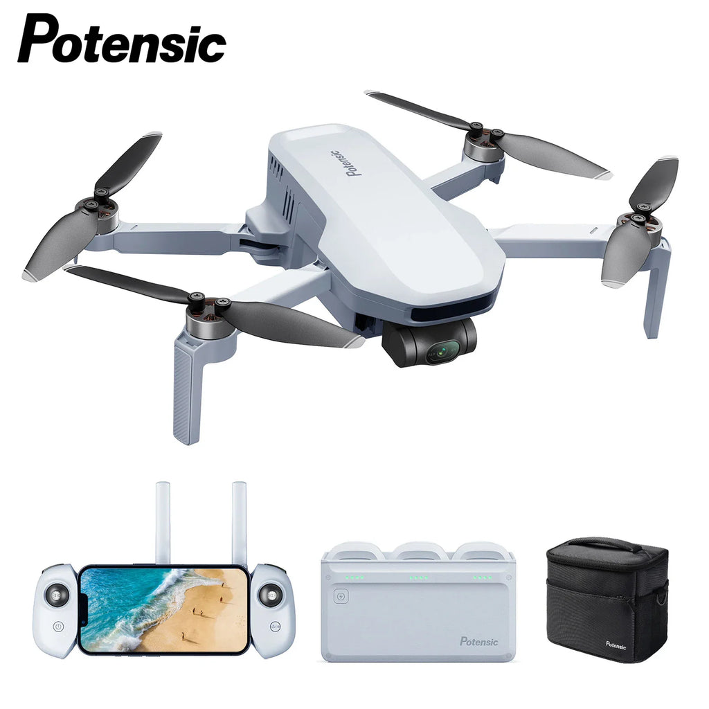Grey mini quadcopter drone with remote controller, battery charging hub, and carrying case