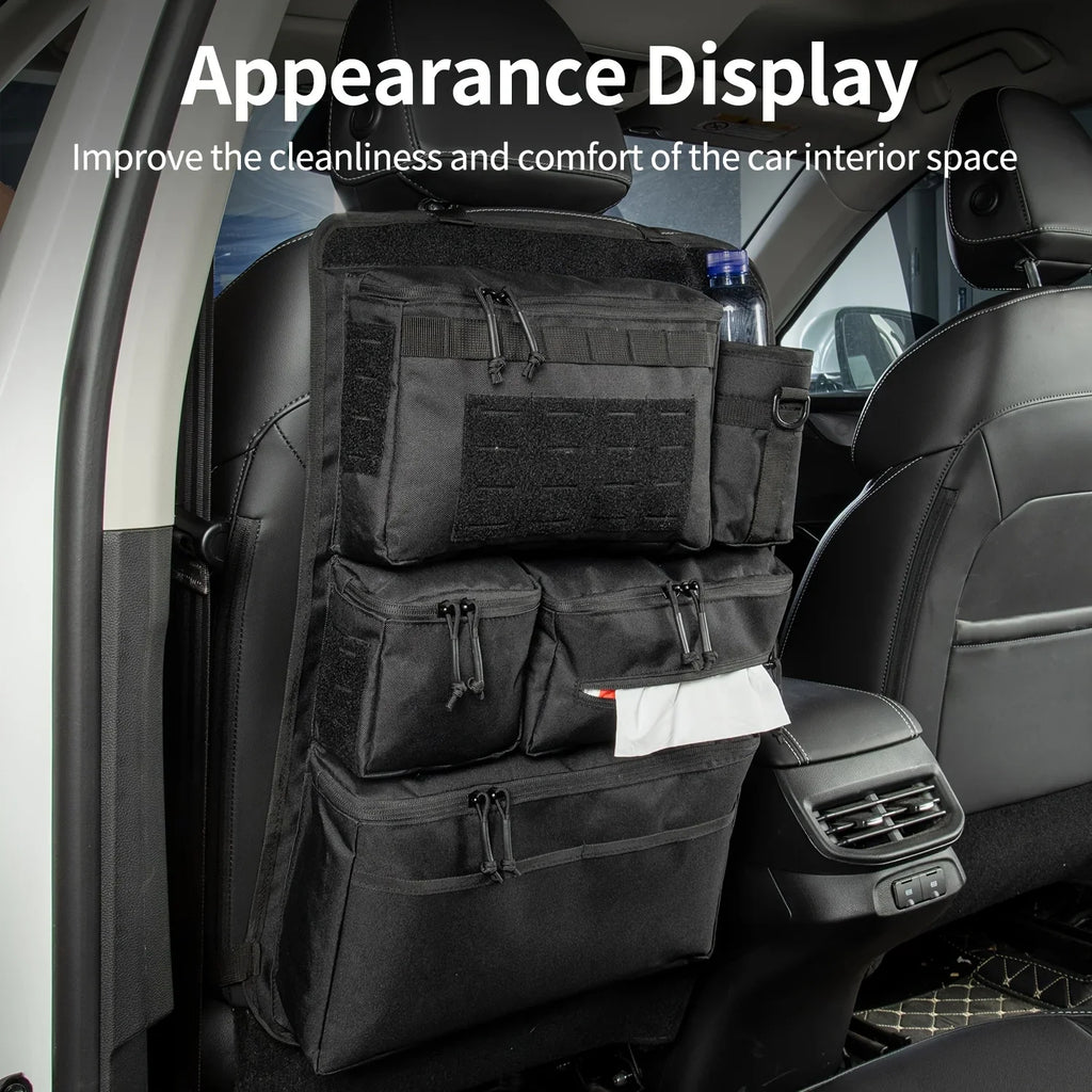 Black tactical car seat back organizer installed in a vehicle