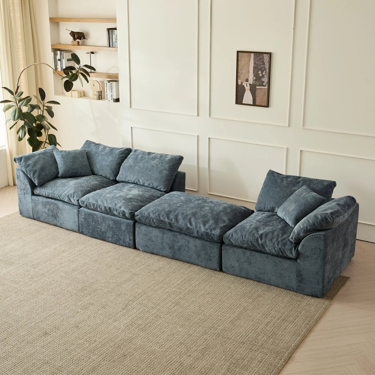 Blue modular sofa arranged in a long row configuration.