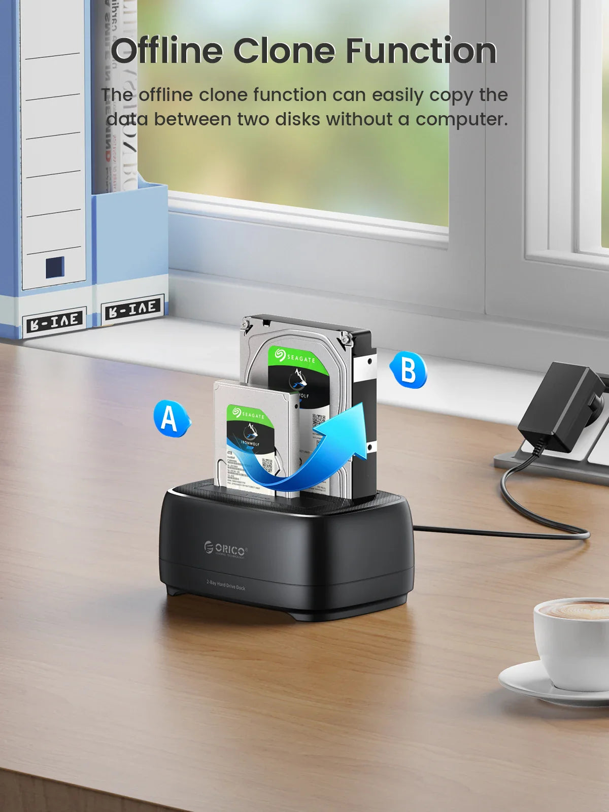 Hard drive docking station on a desk showing offline cloning process