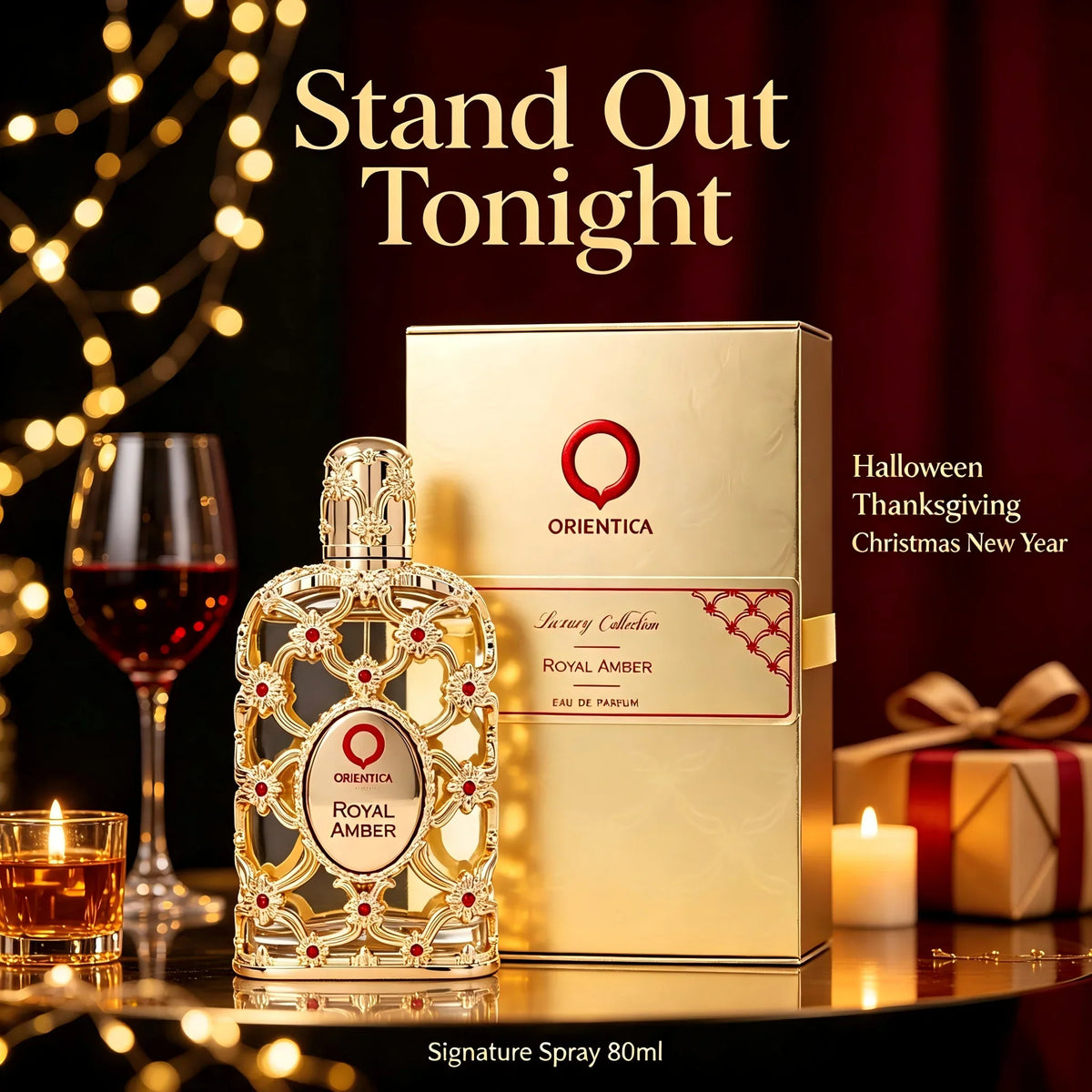 A glass bottle of gold perfume next to its gift box and a glass of red wine on a festive table.
