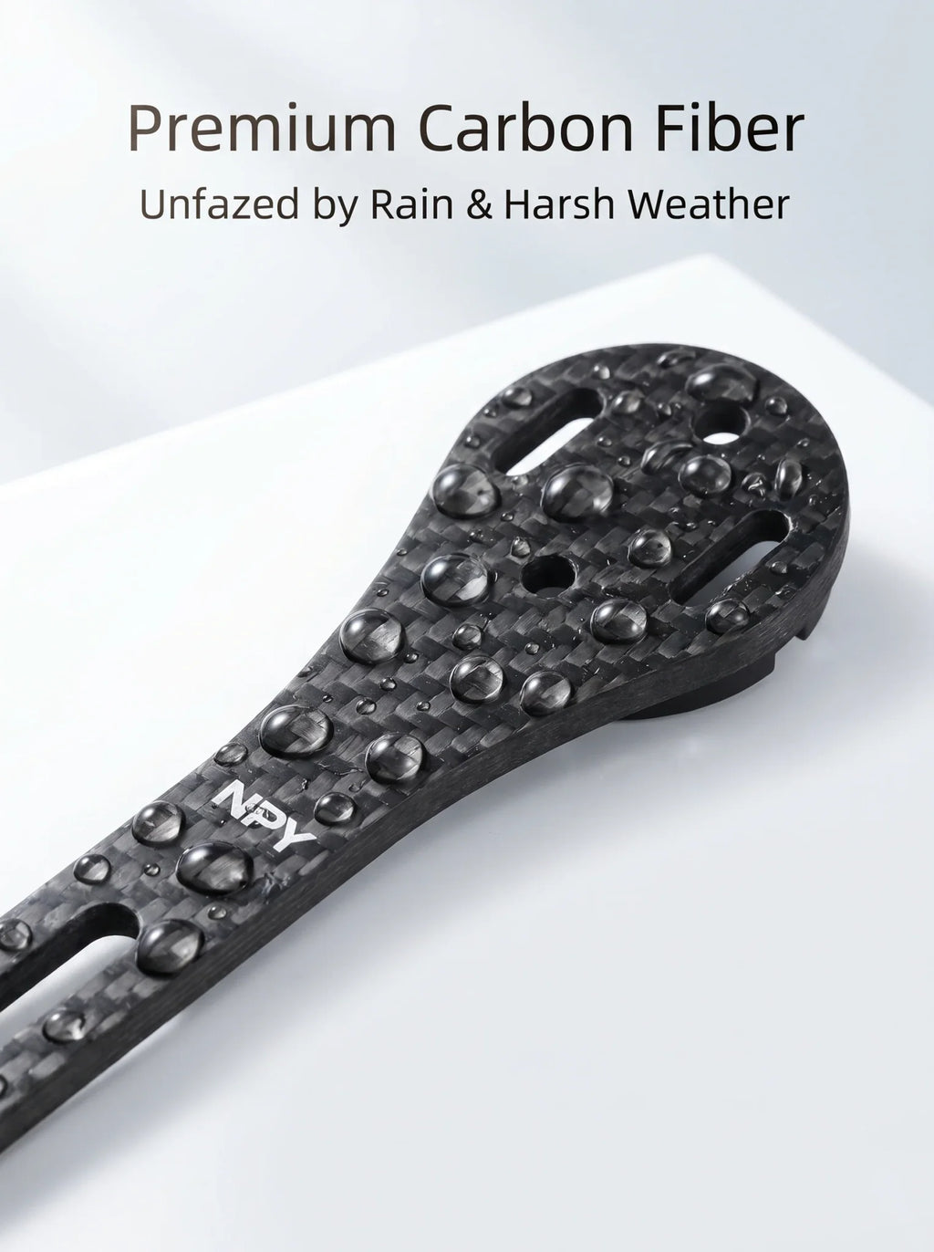 Close-up of premium carbon fiber bicycle computer mount with water droplets