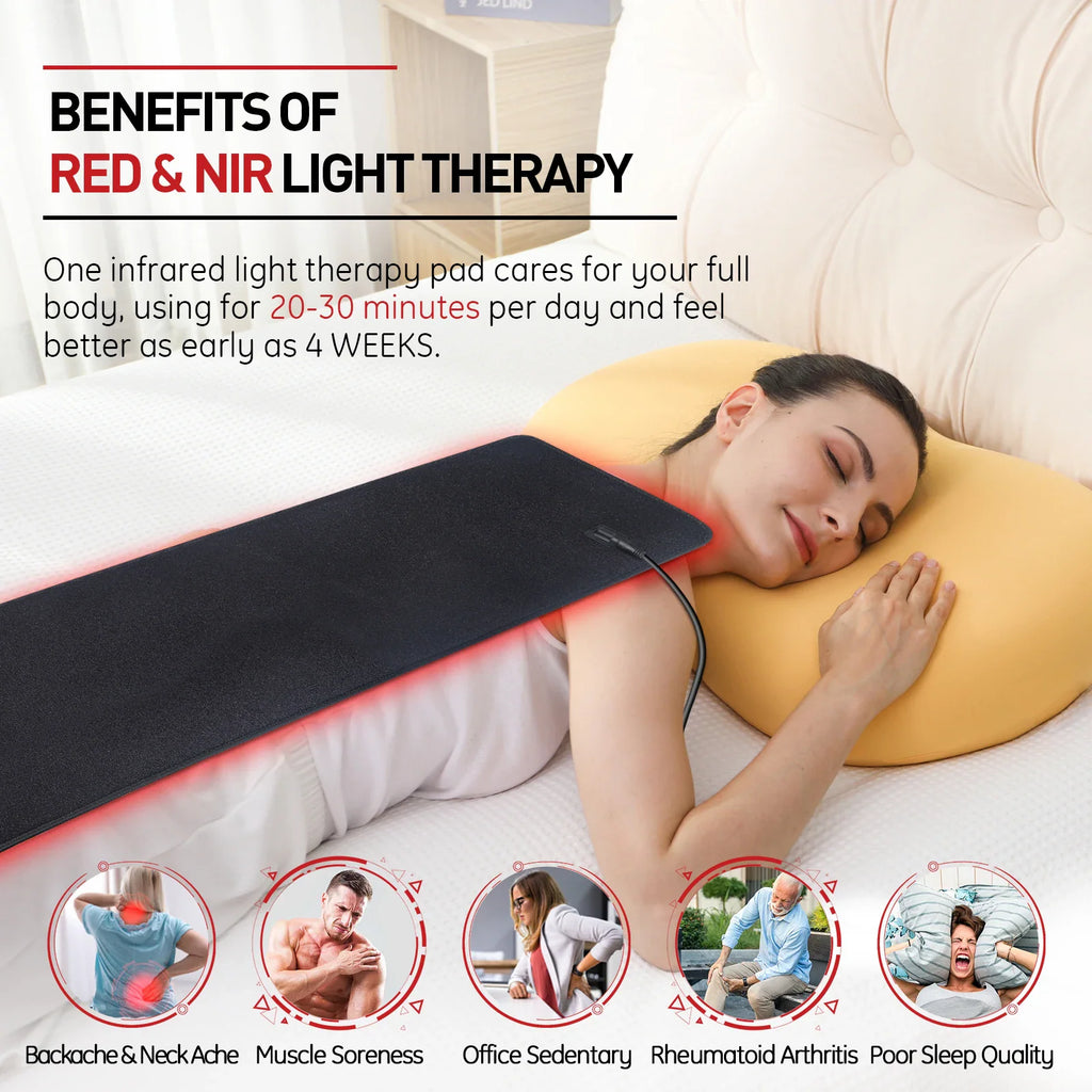 Woman lying on a bed using a red light therapy pad for muscle recovery and pain relief